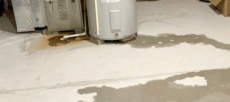 water softener system that has water running from it due to leak